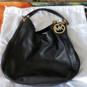 Soft leather Michael Kors purse.